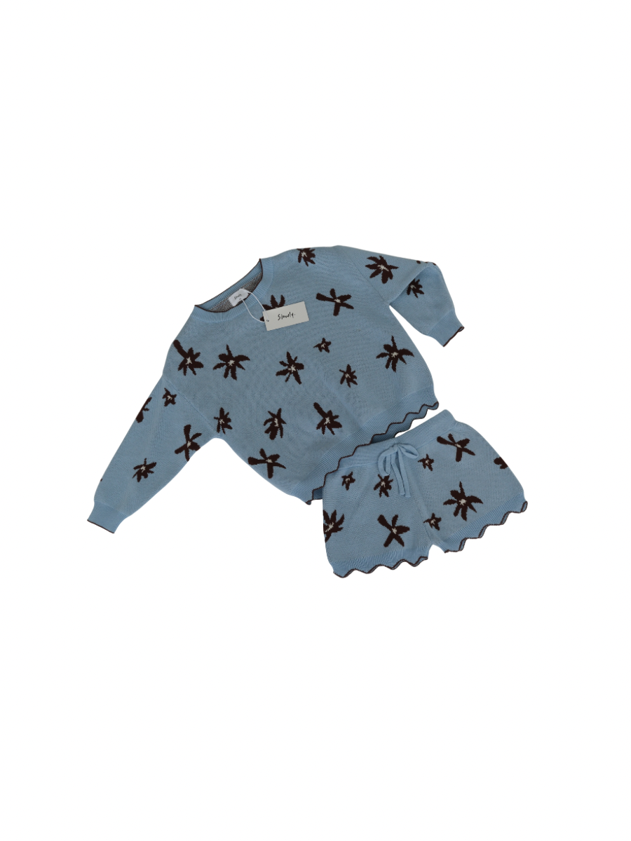 Blue children's outfit with brown patterns on a white background