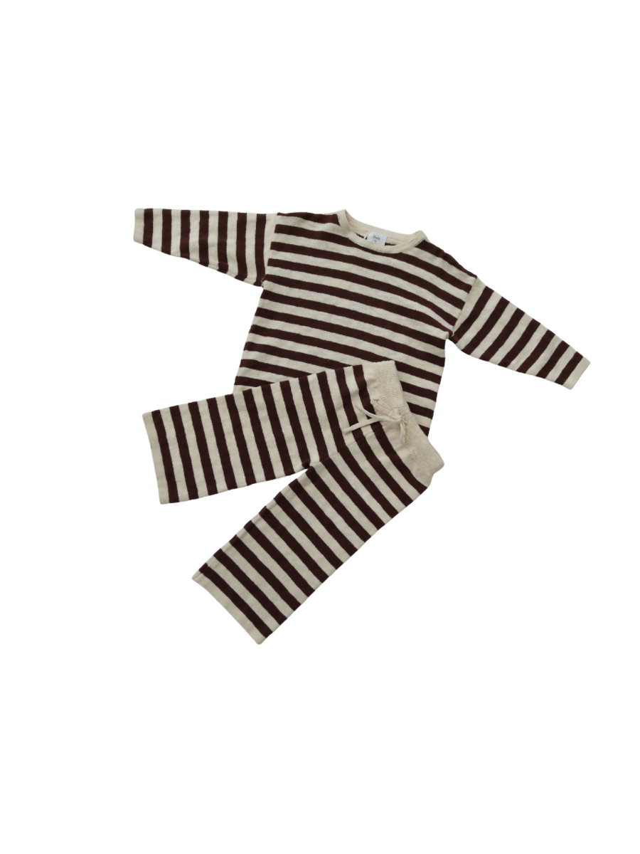 Striped pajama set with long-sleeve top and pants on a white background
